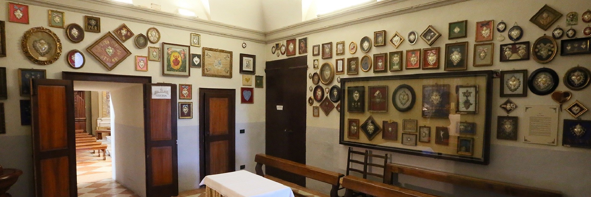 The votive offerings and the Stone Cross